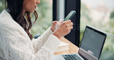 Buy stock photo Hands, phone and typing with freelance woman in home for planning, research or text message at window. App, contact and laptop with remote work employee at desk in apartment for communication