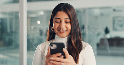 Buy stock photo Phone, happy and businesswoman in office with networking, communication or email on mobile app. Smile, technology and female person with cellphone for contact, texting or research online in workplace