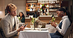 Phone, bored and couple on date in restaurant together for networking, social media or texting. Cellphone, argument and interracial man with woman on technology for chatting on mobile app at dinner.