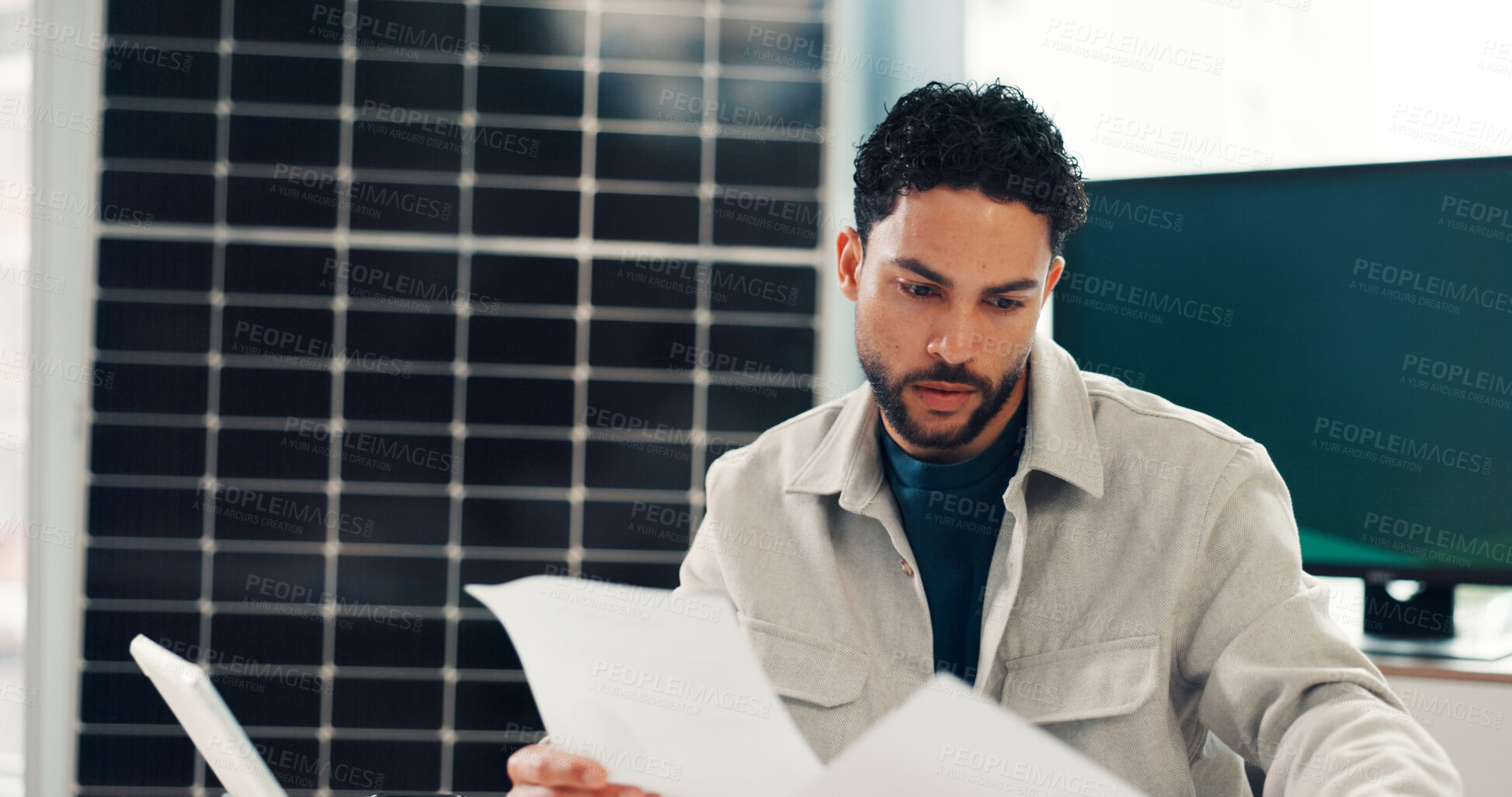 Buy stock photo Business, man and document in office for environment report, energy saving and sustainable. Male person, laptop and paperwork on photovoltaic grid update, company performance and solar panel proposal