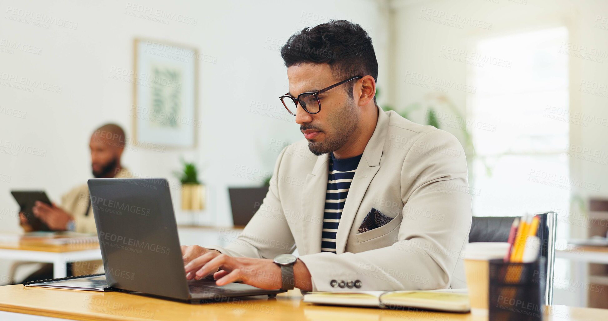 Buy stock photo Typing, business man and laptop in office for editing press release, monitor news coverage or review. Coworking, media relations manager and tech at PR agency for statement draft and email response