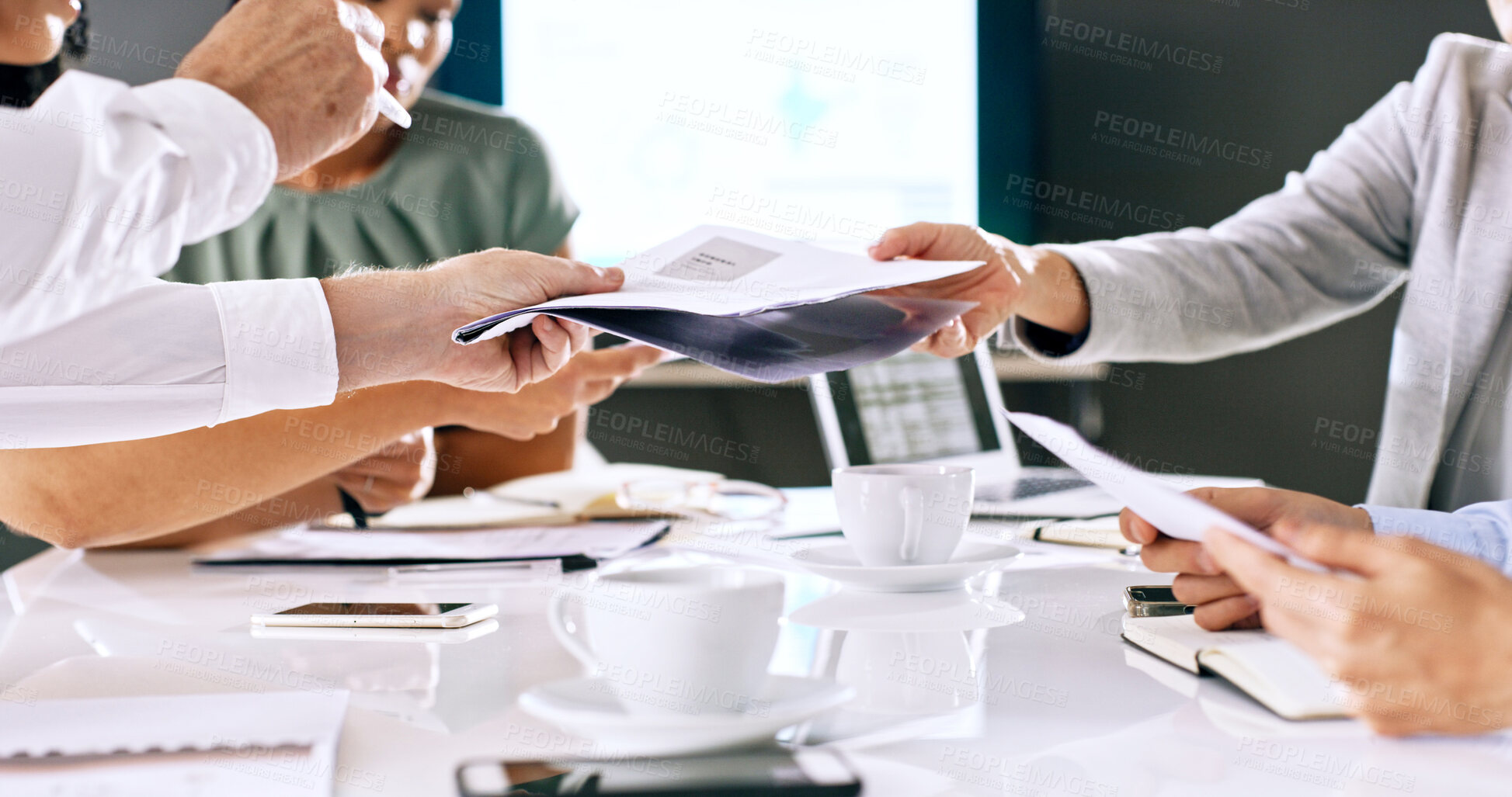 Buy stock photo Collaboration, documents and hands of business people in boardroom for planning or project management. Meeting, paperwork and pass with employee group at table in workplace for discussion or feedback