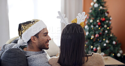 Buy stock photo Relax, hug or couple in living room with Christmas tree, celebration or bonding together for holiday. Love, connection or happy people with embrace in home, festive season or support for relationship