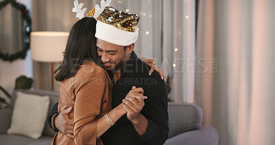 Buy stock photo Couple, love and dancing in home, Christmas or bonding on festive event, happy and romance in lounge. Xmas, celebration and people with smile for December holiday, embrace and commitment to marriage