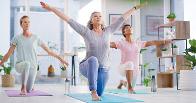 Buy stock photo Elderly women, fitness and stretching with yoga class for spiritual wellness or balance together. Senior people, yogi and coaching in warrior pose for warm up, mindfulness or indoor exercise on mat