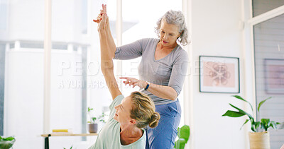 Buy stock photo Women, yoga and meditation in class, help and support with wellness, fitness and chakra energy. Mature people, instructor and teacher in health club, calm and breathing with discussion and stretching