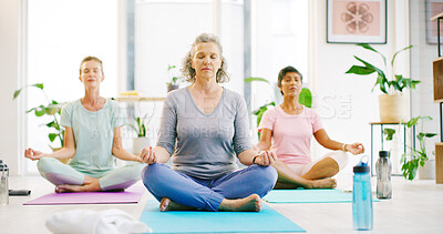 Buy stock photo Yoga class, mature women and mediation for zen, mindfulness or fitness with peace for calm. Yogi, breathing exercise and people in studio, health or holistic balance for spiritual wellness with mudra