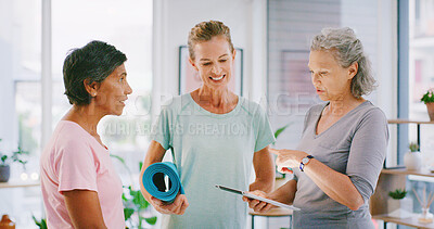 Buy stock photo Yoga, tablet and mature people in studio, check member registration and digital enrolment for class. Membership, yogi and women with tech to review sign up sheet, online record and application form