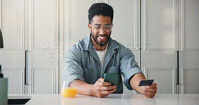 Buy stock photo Happy, man or credit card in home with phone, payment or Black Friday discount for online shopping. Person, typing and fintech in apartment with tech, bank transaction and eft purchase for ecommerce.