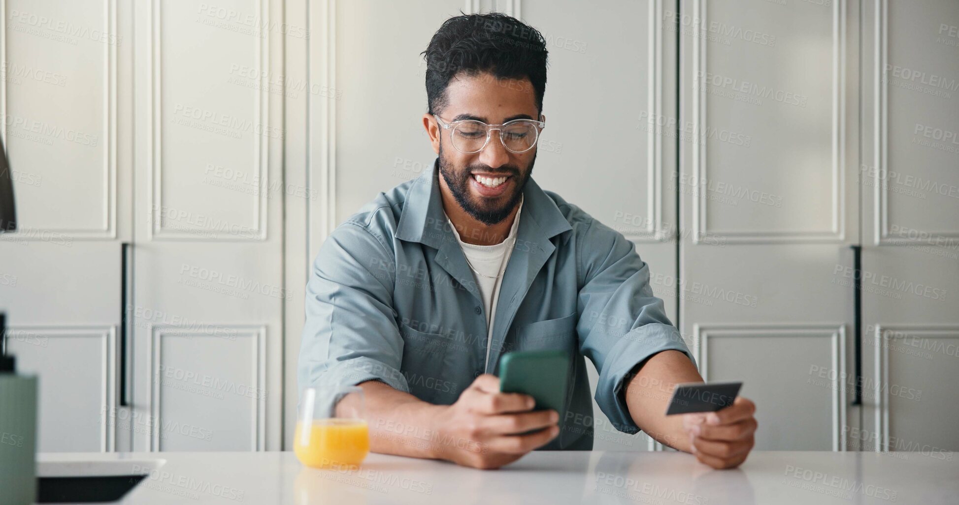 Buy stock photo Happy, man or credit card in home with phone, payment or Black Friday discount for online shopping. Person, typing and fintech in apartment with tech, bank transaction and eft purchase for ecommerce.