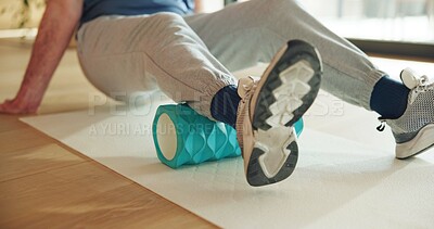 Buy stock photo Legs, stretching and man with foam roller, physical therapy and muscle recovery with wellness. Health facility, person and patient with exercise, mobility training or rehabilitation with healing