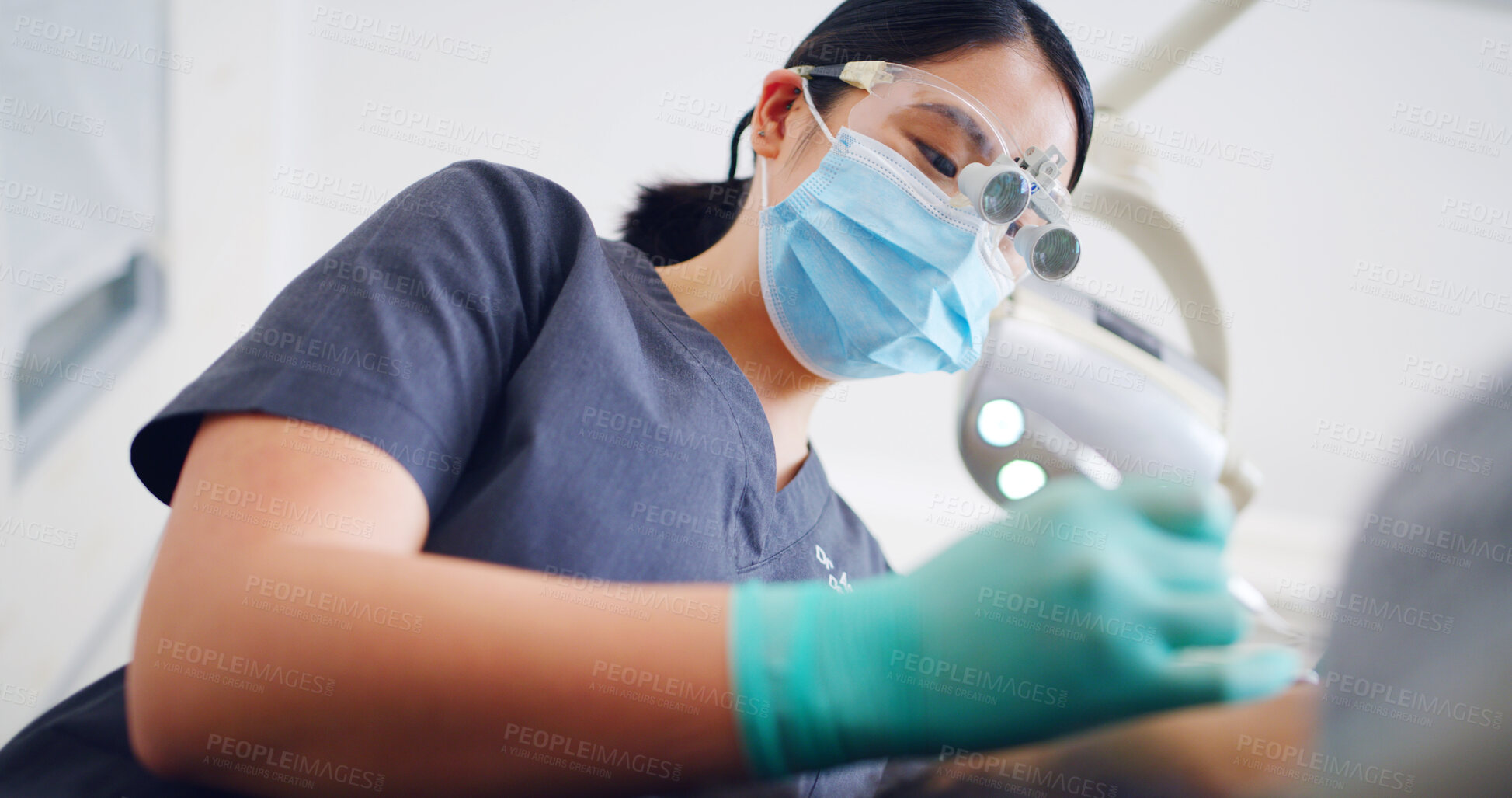 Buy stock photo Cleaning, consulting or healthcare with dentist and patient in office for dental care or hygiene. Appointment, checkup or dentistry exam with people in clinic for assessment or whitening from below
