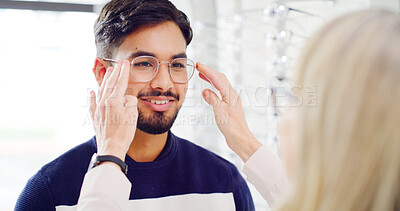Buy stock photo Optometry, glasses and man with appointment, help and smile with clear vision, choice or retail. Ophthalmology, customer and patient with eyewear, healthcare and spectacles with medical consultation