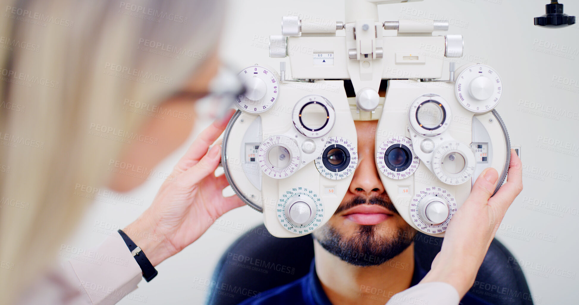 Buy stock photo Optometrist, client or man with phoropter for eye exam, vision test or determine prescription for clear sight. Assessment, optometry or people with lens selection machine, consultation or clinic