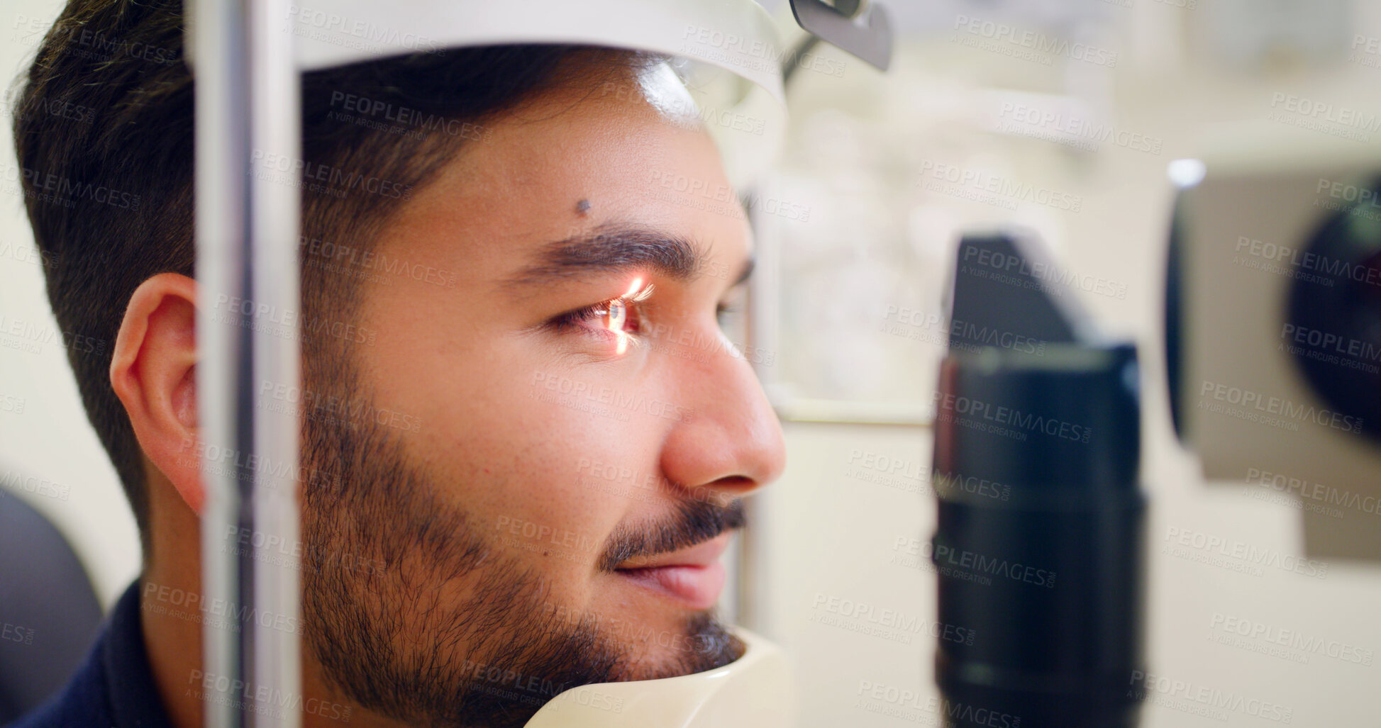 Buy stock photo Man, eye test and laser machine for optometry inspection, eyesight correction and cornea procedure. Male person, equipment and light of ophthalmology assessment, retinal evaluation and testing vision