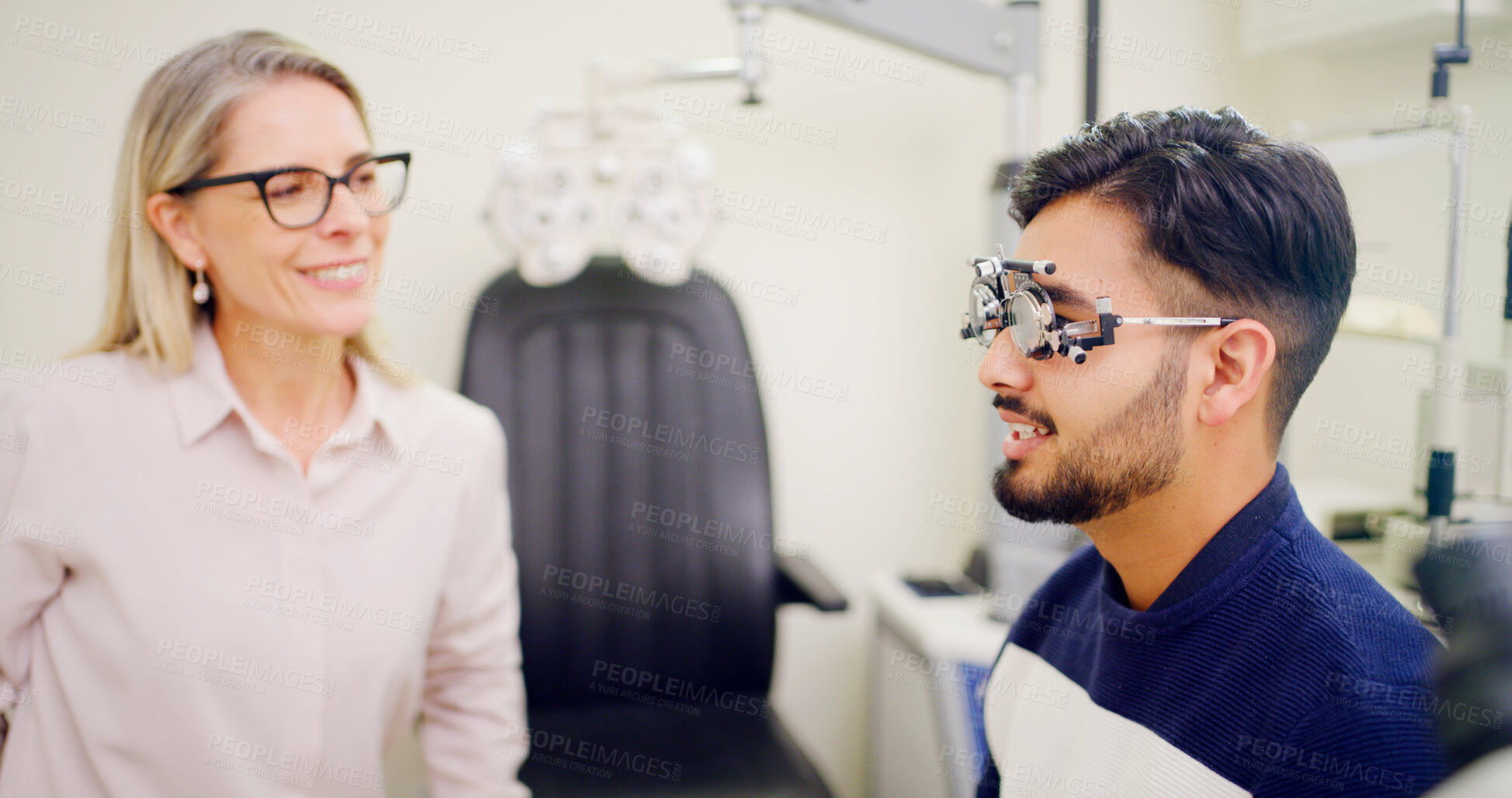 Buy stock photo Optometrist, client or trial frame for eye exam, vision assessment or consultation for clear sight. Clinic test, optometry or people with tool to determine lens prescription, iris health or smile