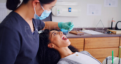 Buy stock photo Dentist, patient and inspection with mouth mirror for teeth assessment, oral exam and appointment in office. Dental care, specialist and women with tools for cavity check, gum health and consultation