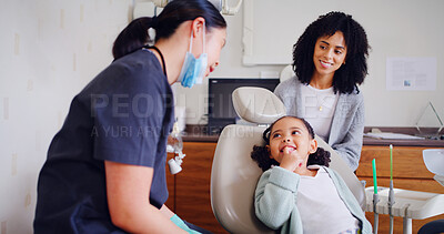 Buy stock photo Child, smile and dentist for consultation with discussion, oral hygiene and mouth cleaning service. Mother, health professional and orthodontic inspection for dental care with patient for checkup
