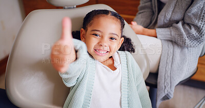 Buy stock photo Portrait, smile and thumbs up with girl at dentist for optometry goals, success or support. Emoji, hand gesture and motivation with child in chair at dental clinic for healthcare or wellness