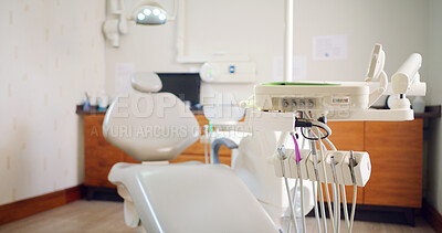 Buy stock photo Dentist, equipment and chair in empty clinic for appointment, consultation or treatment service. Orthodontist, furniture and tools for dental checkup with oral health. mouth hygiene or wellness.