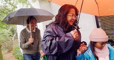 Buy stock photo Winter, umbrella and smile with grandparents and children for rainfall season, support and holding hands. Rain, happy and help with people and kids at family home for shelter and storm protection