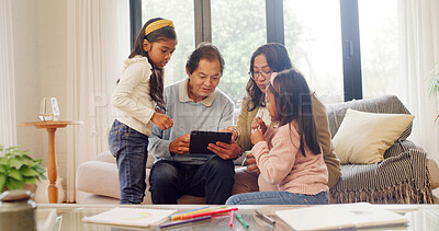 Buy stock photo Children, girl and parents with tablet in lounge for online search, subscription site and family bonding. Check film selection, streaming app and people with tech to watch movie, connection and home