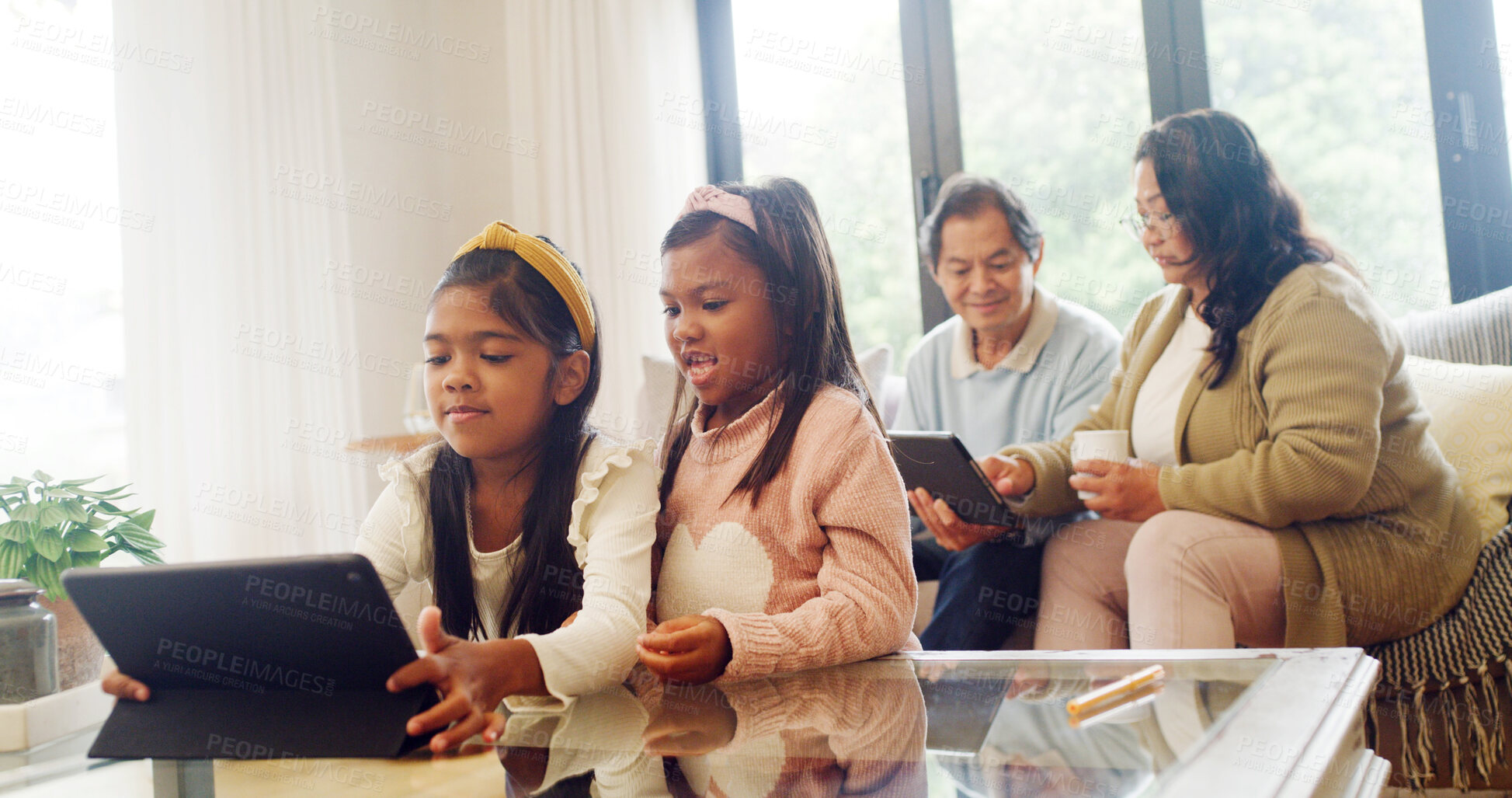 Buy stock photo Tablet, reading and grandparents with children in home for streaming service, film search and cartoon. Online movie subscription, bonding and entertainment with senior people in family house