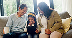 Child, girl and parents with tablet in lounge, subscription site and comedy film for morning bonding. Check film selection, streaming app and people with tech to watch video, laughing and family home