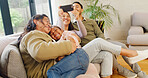Happy family, laughing and home with child on sofa for fun childhood, love or care together. Mom, dad and grandma with smile, kid or granddaughter for weekend, holiday or bonding on couch in house