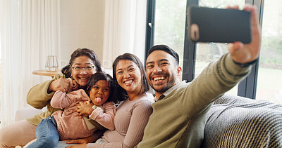 Buy stock photo Portrait, grandma and parents with child, selfie and bonding in living room, happy and memory on web. Laughing, grandparent and people with girl in house, photography and picture for social media