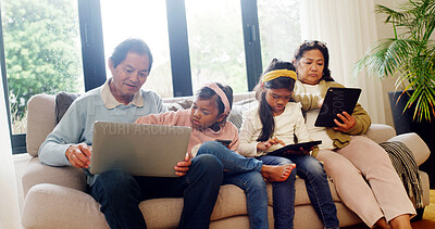 Buy stock photo Tech, relax and grandparents with children on sofa for streaming service, film search and laptop. Online movie subscription, tablet and entertainment with senior people and kids in family house