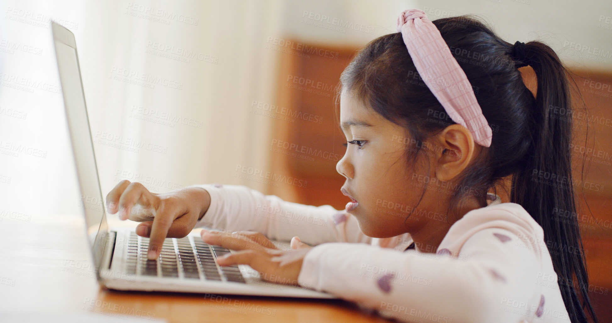 Buy stock photo Typing, curiosity and child in house with laptop, testing and digital skills in early learning. Online, interactive or kid in home with pc, practice or tech activity in childhood development.