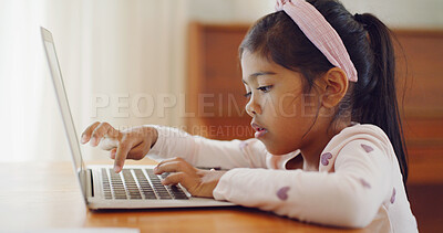 Buy stock photo Typing, curious or kid in house with laptop, testing or digital skills in cognitive learning. Online, interactive or child in home with pc, practice or tech activity in childhood development.