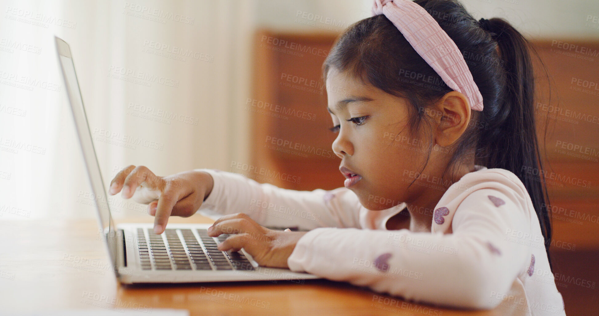 Buy stock photo Typing, curious or kid in house with laptop, testing or digital skills in cognitive learning. Online, interactive or child in home with pc, practice or tech activity in childhood development.