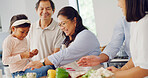 Grandparents, parents and child in kitchen for cooking, learning skills and help for lunch. Family home, senior generation and happy mom, dad and kids for bonding, love and prepare food for supper