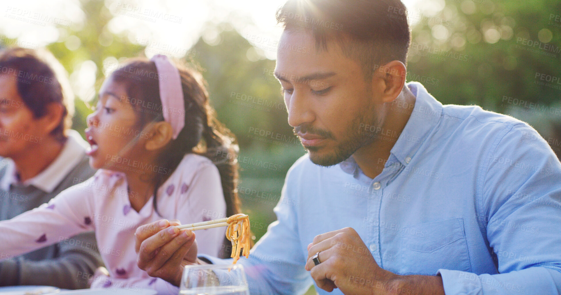 Buy stock photo Eating, man or Asian family at table with meal, bonding together and reunion in healthy relationship. Gathering, bokeh and people outdoor with feast, connection and shared food in tradition.