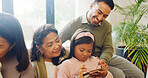Happy family, smartphone gaming and girl on sofa, internet and bonding together with help. House, grandparents and mother with father, children and cellphone with online contest, app and competition