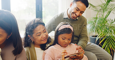 Buy stock photo Grandmother, smartphone gaming and girl with father, internet and bonding together with help. House, grandma and mother on couch, children and cellphone with online contest, app and competition