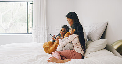 Buy stock photo Relax, mother and children on bed with tablet on weekend morning, bonding and streaming movie together. Social media, subscription platform and girls with woman in home, tech and connection for love