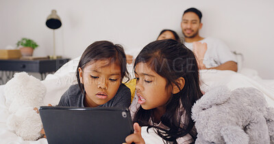 Buy stock photo Tablet, relax and kids with parents in bedroom in home for streaming service, film search and cartoon. Online movie subscription, bonding and entertainment with children in family house for series