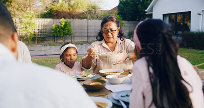 Buy stock photo Meal, grandparent or child in backyard with serving, bonding together or reunion in healthy relationship. Love, hosting and Asian family in house with feast, connection or shared food in tradition.