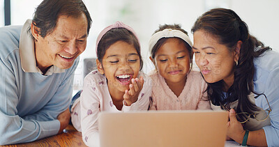 Buy stock photo Happy, grandparents and children with laptop, home and watching funny movie on web, love and bonding. Streaming, online and elderly people with tech for videos, family and laughing at comedy in house