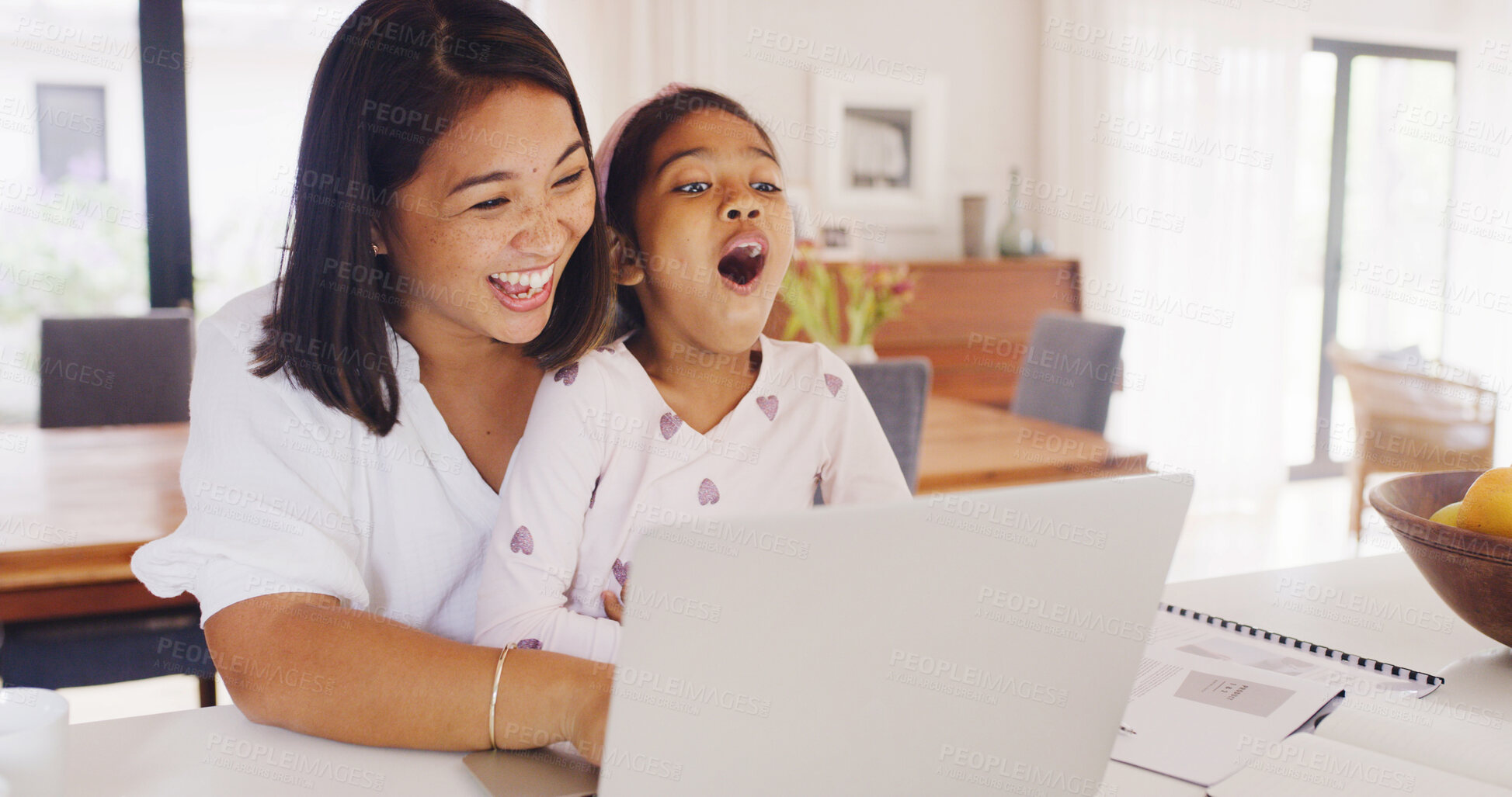 Buy stock photo Happy mom, child and home with laptop for ebook, entertainment or laugh for funny comic together. Mother, kid or daughter with surprise reaction for comedy story, humor or fun subscription in house