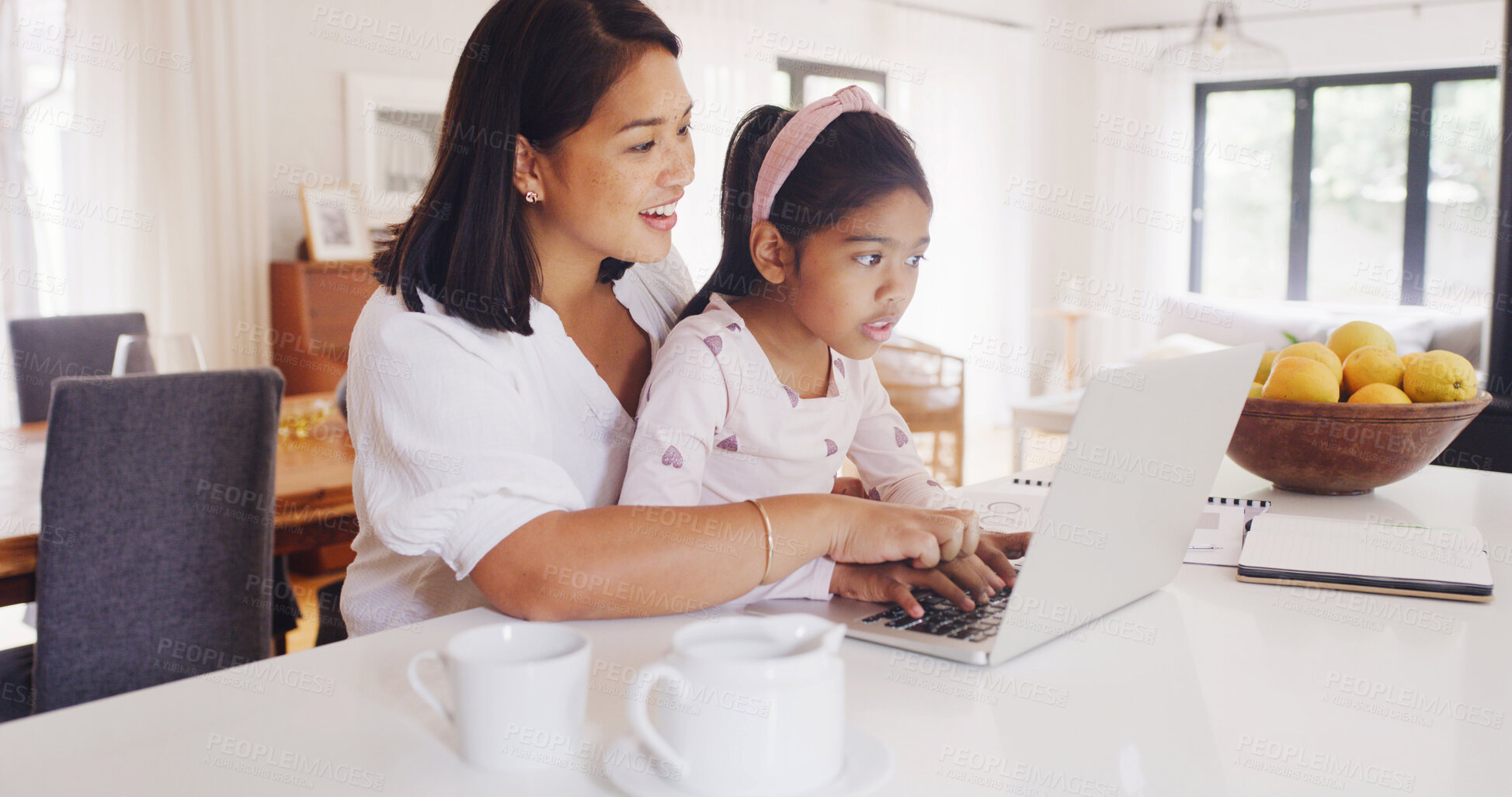 Buy stock photo Laptop, remote work and mom with kid in kitchen for multitask with creative project deadline. Computer, freelancer and mother with girl child for typing with email or contact for publishing in home.