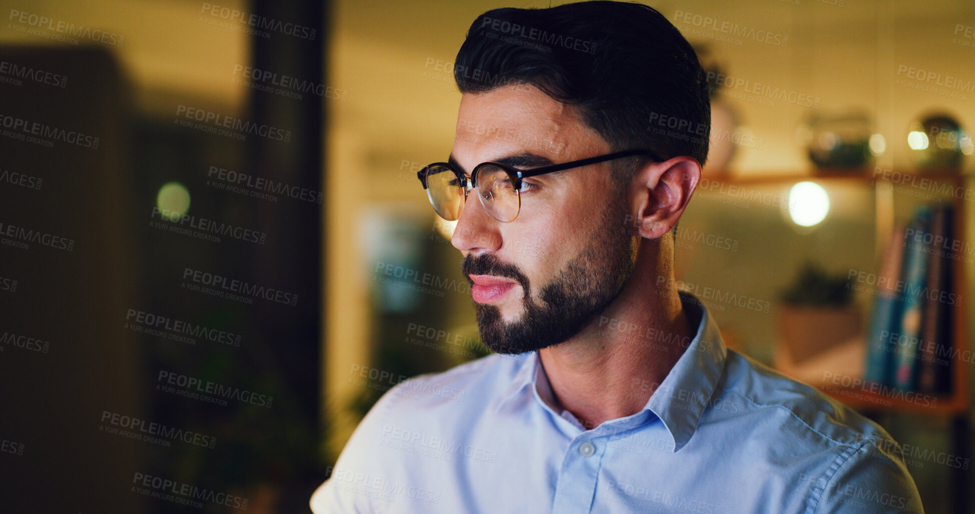 Buy stock photo Man, computer and night at startup with review, project management and glasses at media company. Person, journalist and overtime with pc, insight or editing process for article at creative agency