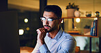 Computer, man and thinking in office at night for article review, proofreading and fact checking. Editor, employee and technology at publishing agency for editing deadline, approval decision or bokeh