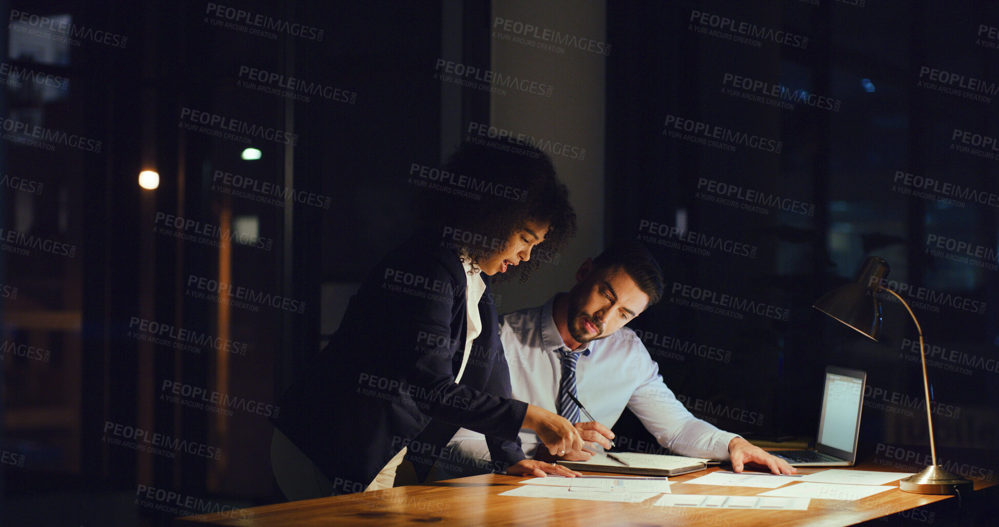 Buy stock photo Discussion, documents and business people in office at night with planning finance report with budget. Meeting, deadline and financial advisors with paperwork for investment proposal in workplace.