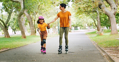 Buy stock photo Roller skating, holding hands and mother with child in nature on holiday, getaway or weekend trip with balance. Happy, safety and mom with kid in skates for hobby together outdoor in park on vacation