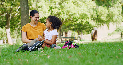 Buy stock photo Rollerskate, smile and mother with daughter in park for support, relax or skating game. Rollerblade, happiness and summer vacation with woman and child in nature for bonding, hobby and family holiday