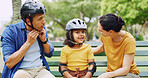 Bench, helmet and protection with family in park together for bonding, child development or fun. Getting ready, headwear or safety with mom, dad and daughter people outdoor for responsibility
